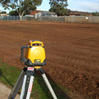 Synthetic turf laser levelling
