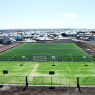 Synthetic grass construction for schools
